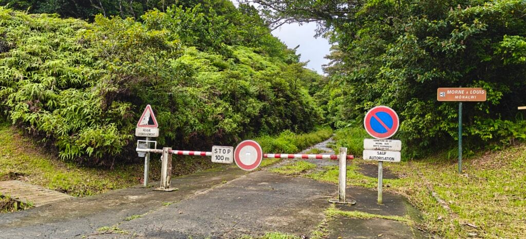 Barrier across an overgrown road